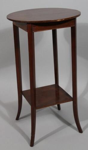 An Edwardian mahogany table