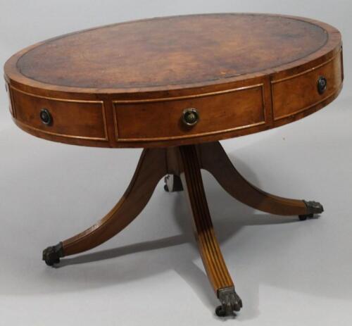 A mid 20thC mahogany drum table