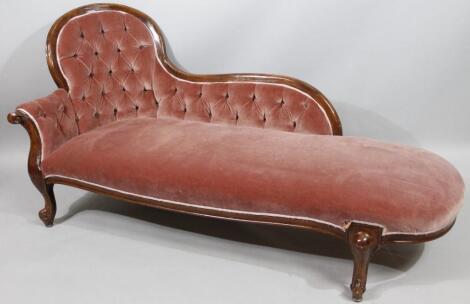 A Victorian rosewood scroll back chaise longue