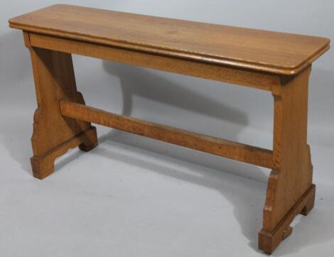 A light oak organist's bench.