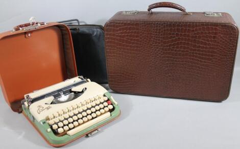 A mid-20thC leather crocodile skin finish travel case