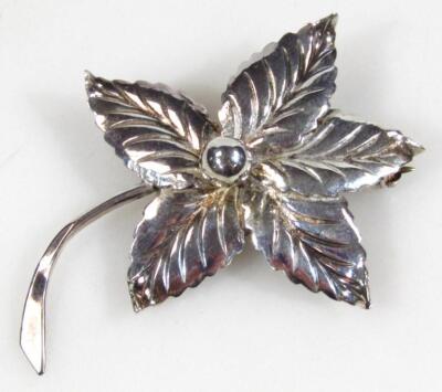 A flowerhead brooch