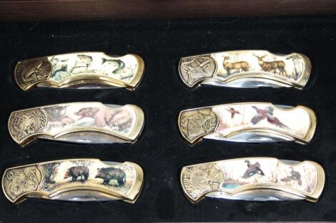 A set of six Franklin Mint collectors pen knives