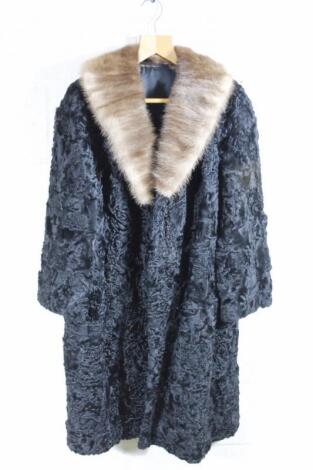 A ladies three quarter length fur coat