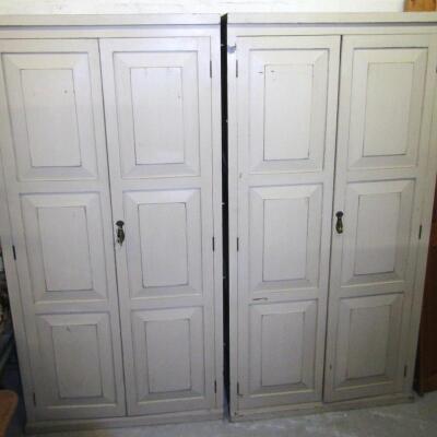 An early 20thC and later quadruple panelled door wardrobe