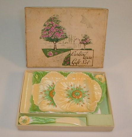 A Carlton ware boxed gift set being a sunflower butter dish and knife