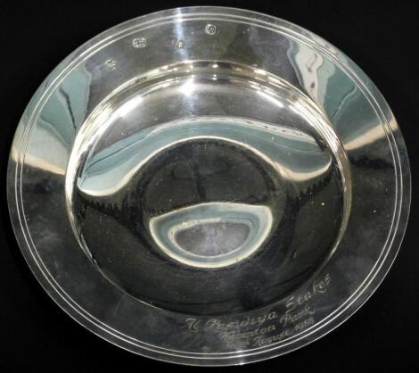 An Elizabeth II silver Armada type dish