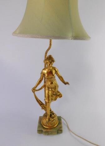 Henryk Kossowski (Fr 1855-1921). Gilt metal figural table lamp modelled as a young woman walking thr