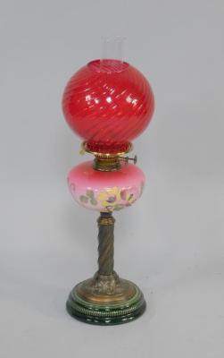 A Duplex late 19thC copper and green ceramic oil lamp