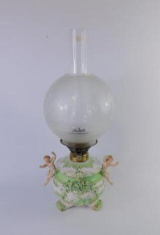 A Continental late 19thC porcelain oil lamp