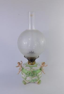 A Continental late 19thC porcelain oil lamp