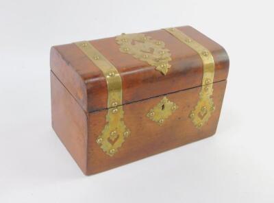 A Victorian walnut domed tea caddy