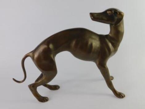 A brass figure modelled as a greyhound