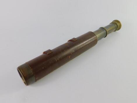 A Broadhurst Clarkson & Co brass four draw telescope, leather bound, 79cm long extended.