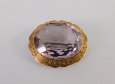 A Victorian oval amethyst brooch