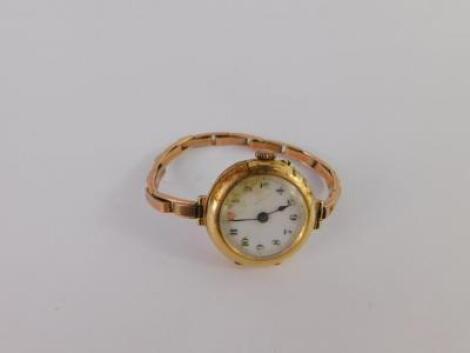 A lady's 15ct gold circular cased wristwatch