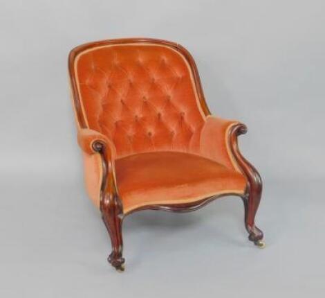 A Victorian mahogany spoon back nursing chair