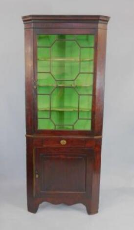 A George III mahogany corner cupboard display cabinet