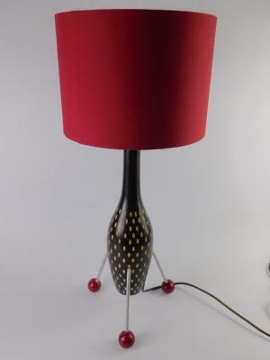 A wooden atomic table lamp