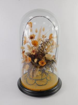 A Victorian dried flower and fern arrangement