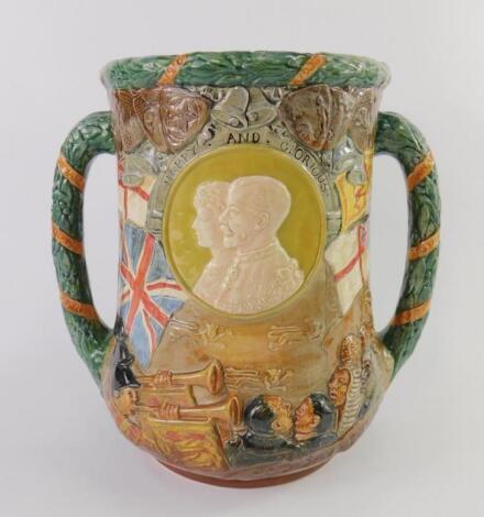 A Royal Doulton pottery loving cup