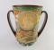 A Royal Doulton pottery loving cup