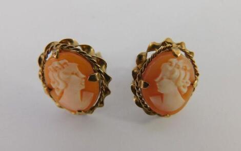 A pair of 9ct gold and oval cameo earrings