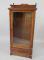 An Edwardian mahogany bookcase or music cabinet