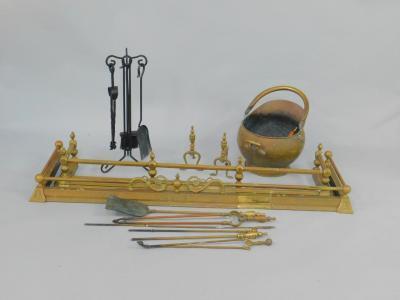 A Victorian brass extendable fender