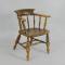 A Victorian oak and elm smoker's bow chair.