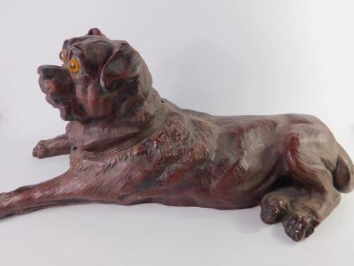 A late 19thC plaster figure of a Pug Dog