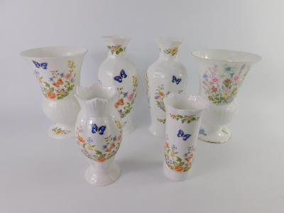 Five Aynsley porcelain vases decorated in the Cottage Garden pattern