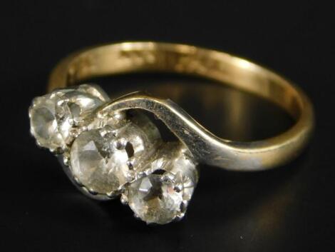 A three stone diamond ring