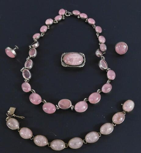 A set of white metal and rose quartz jewellery