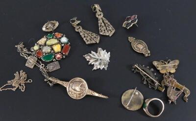 A collection of silver and white metal jewellery