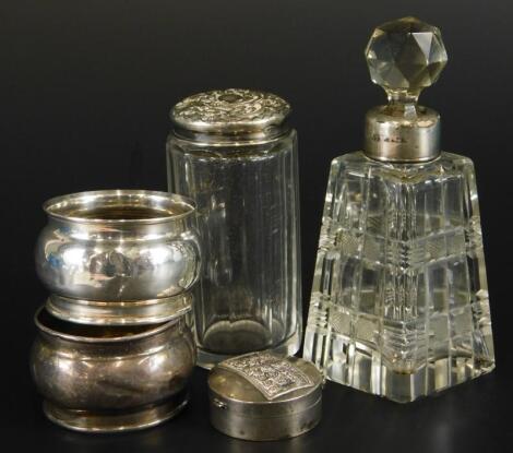 A collection of small silver and white metal items