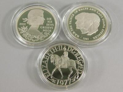 Three silver commemorative coins