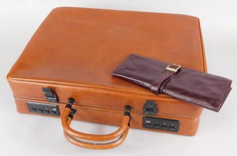 A black Appeal brown leather combination briefcase