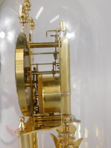 A Kundo brass anniversary clock