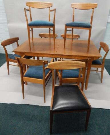 A retro style teak extending dining table