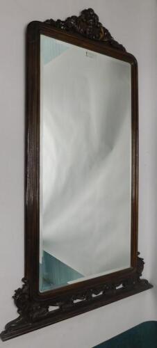 A Flemish style oak overmantel mirror