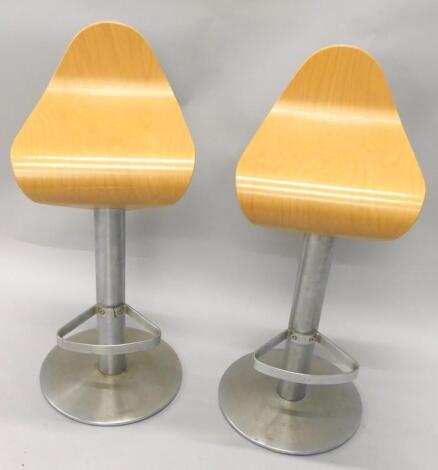 A pair of stylish laminate and brushed aluminium effect bar stools