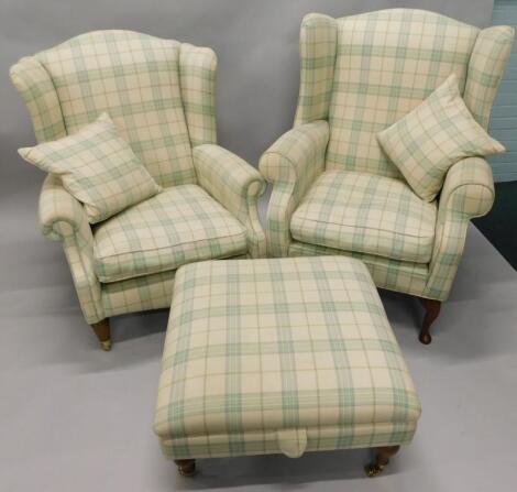 Two similar Laura Ashley type wingback chairs and a matching footstool