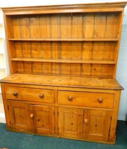 A Victorian and later pine dresser