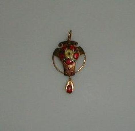 An Arts and Crafts style pendant and an insert brooch