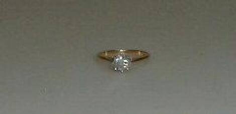 A diamond solitaire ring