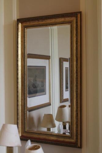 A pair of gilt framed rectangular wall mirrors