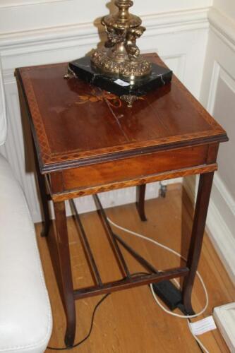 An Edwardian mahogany marquetry occasional table