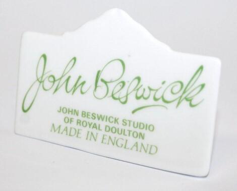 A John Beswick Studio plaque