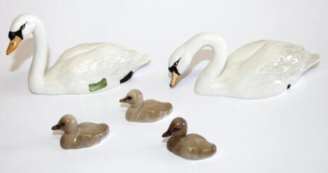 A collection of Beswick swans and cygnets